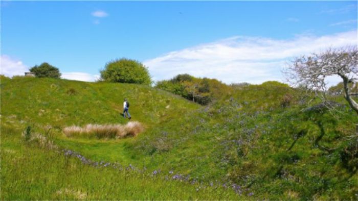 John climbs up the remains of the Motte-and-Bailey - Blackdown Rings ...