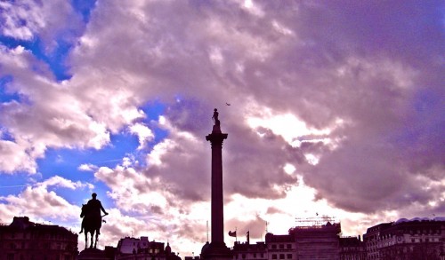 Trafalgar Square - clouds, statues,  aeroplane ...